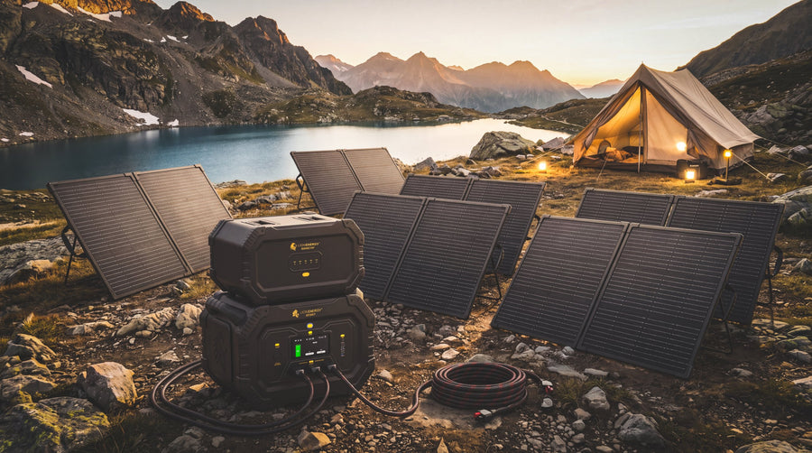 Lion Safari and Safari XP with six folding solar panels at an alpine lake campsite