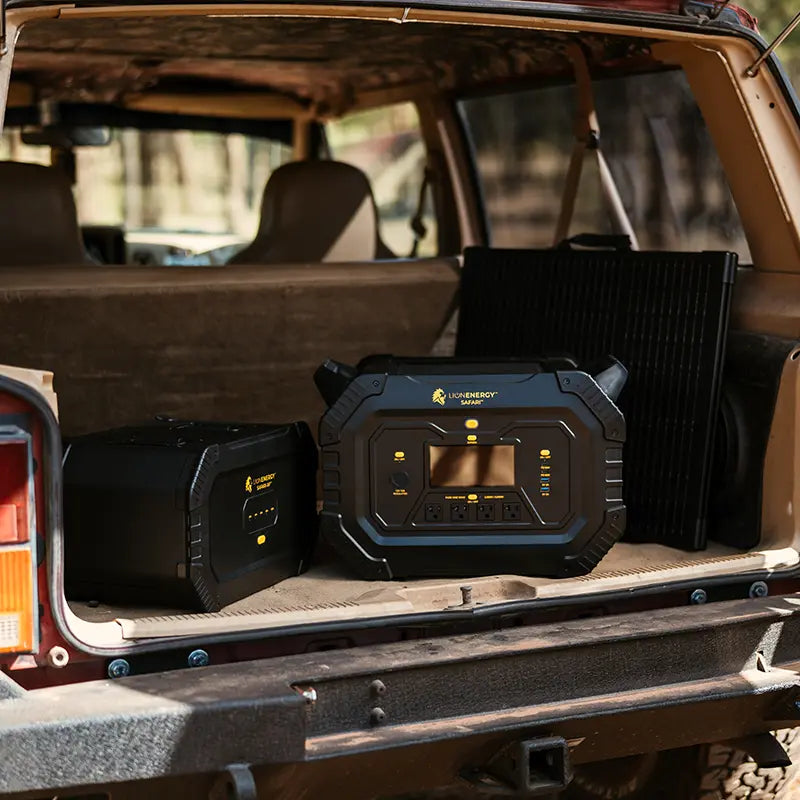 A Lion Safari and Safari XP loaded in the back of an SUV for an overland trip